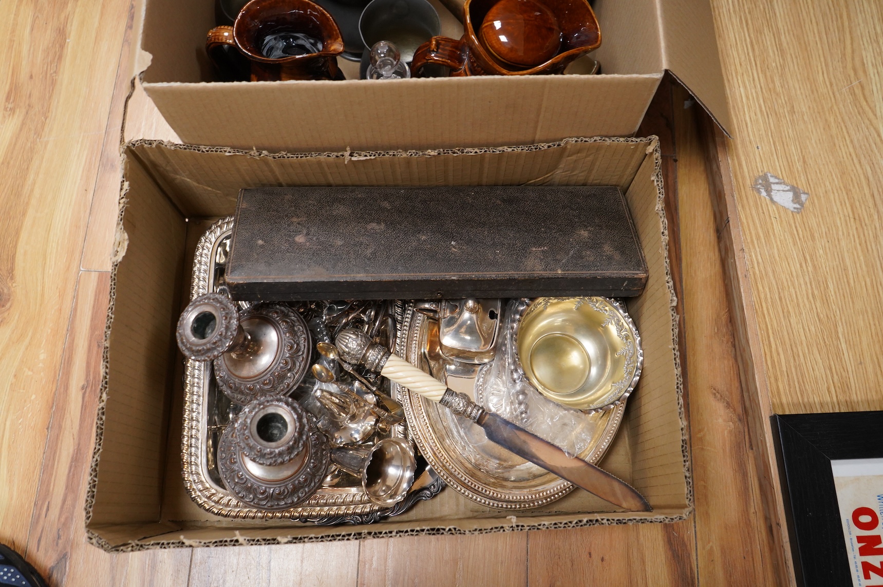 Assorted plated wares including pair of dwarf candlesticks, two pairs of entrée dishes, cased horn handled servers, set of flower holders, bread knife, mustard pot, salver, silver coins, two ceramic toby jugs, four pewte